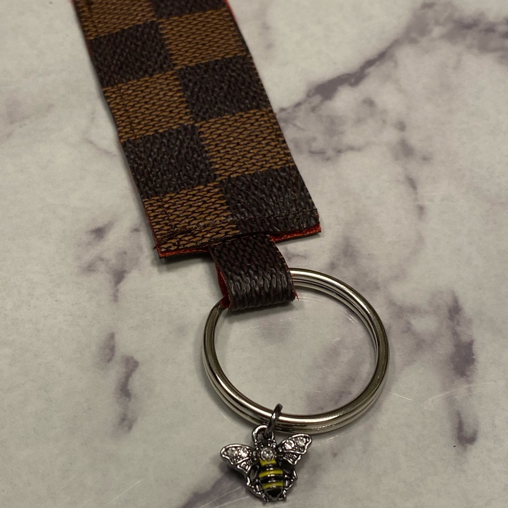 Louis Vuitton upcycled keychain with bee